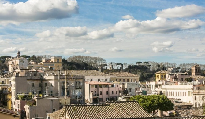 Lounging in the Green Terrace under The Roman Sky